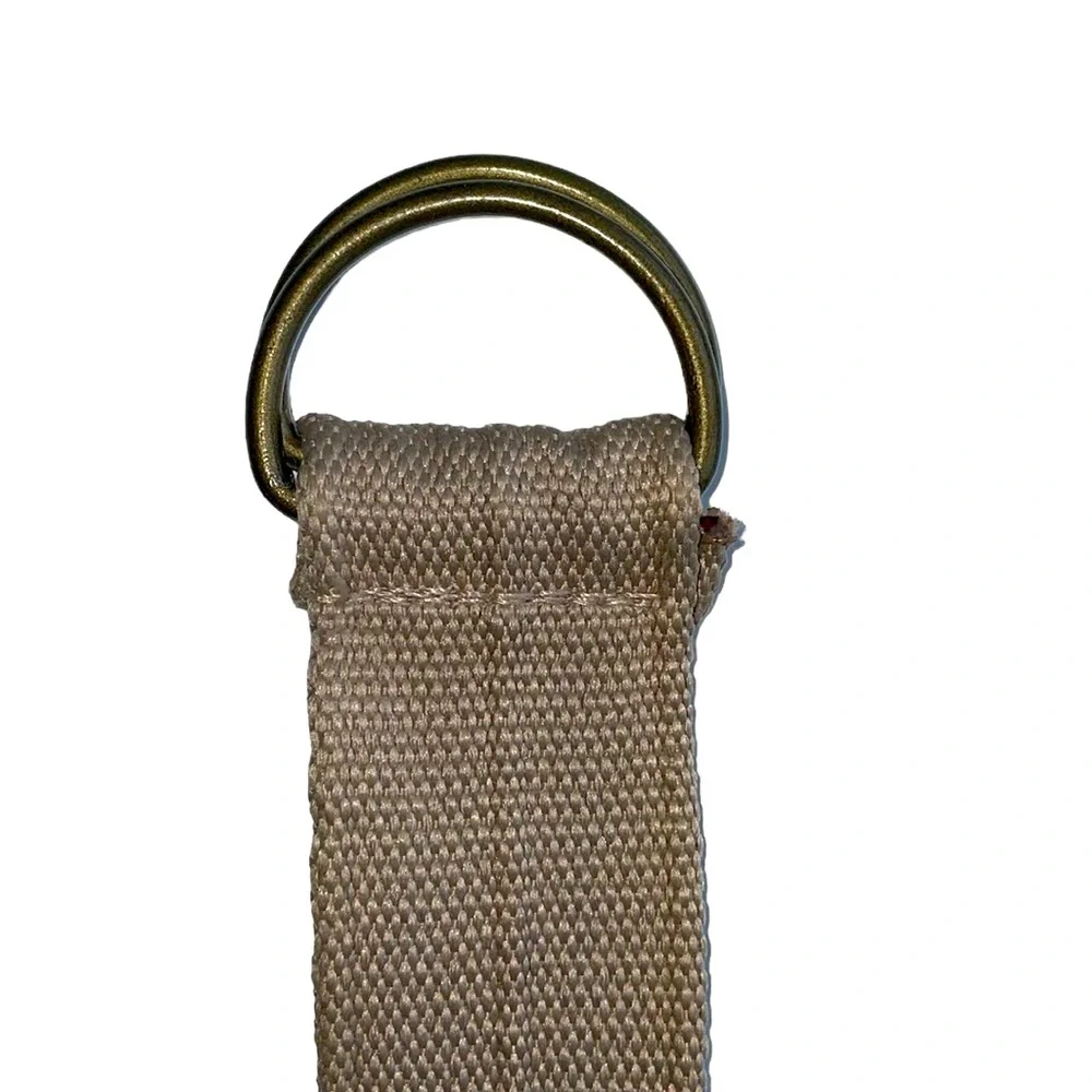 Adjustable light brown woven cotton belt. Matte gold‎ colored buckle. EUC